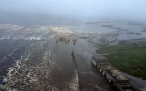 This video grab from a drone handout footage released by Geophysical Service of the Russian Academy of Sciences on July 30, 2025, shows the tsunami-hit Severo-Kurilsk on Paramushir island of Russia's northern Kuril islands. One of the strongest earthquakes ever recorded struck Russia's sparsely populated Far East early on July 30, causing tsunamis of up to four metres (12 feet) across the Pacific and sparking evacuations from Hawaii to Japan. (Photo by Handout / Geophysical Service of the Russian Academy of Sciences / AFP) / RESTRICTED TO EDITORIAL USE - MANDATORY CREDIT "AFP PHOTO / GEOPHYSICAL SERVICE OF THE RUSSIAN ACADEMY OF SCIENCES" - HANDOUT - NO MARKETING NO ADVERTISING CAMPAIGNS - DISTRIBUTED AS A SERVICE TO CLIENTS