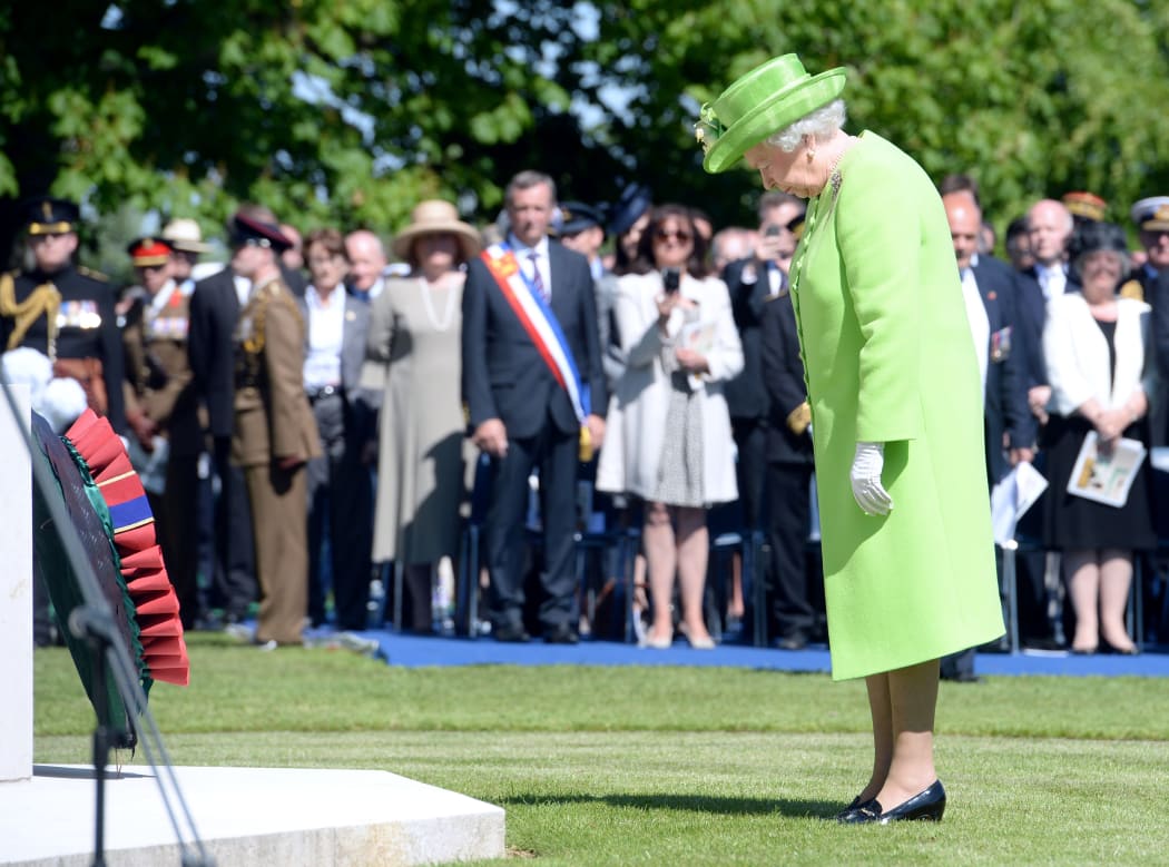 The Queen laid a wreath at the British War Cemetery at Bayeux.
