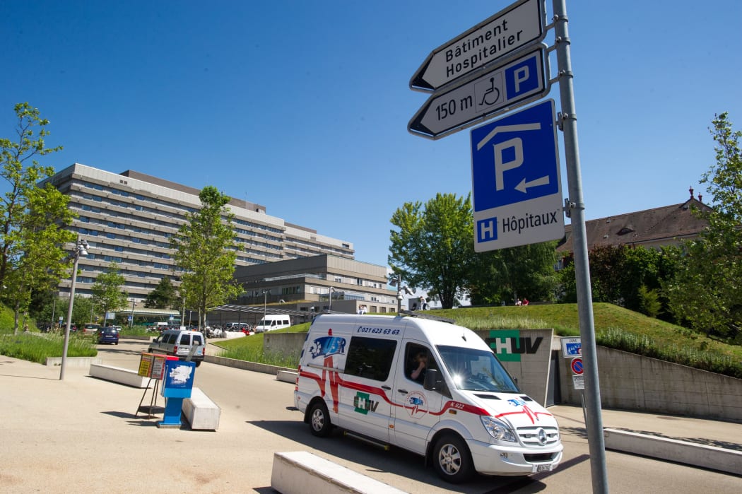 The former world motor racing champion was transferred Lausanne's CHUV hospital.