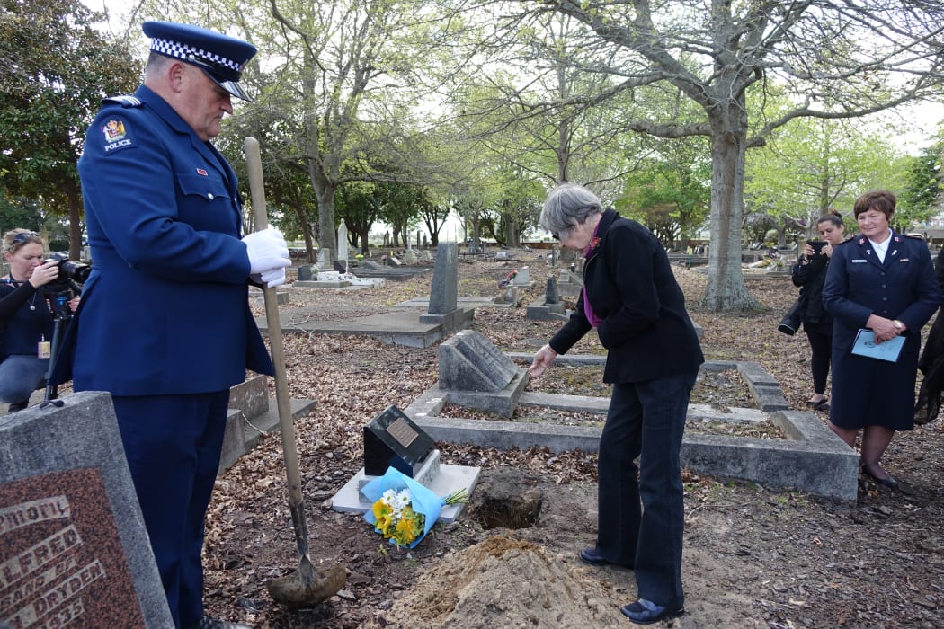 Joyce Sanson, whose grandfather found Christobel Lakey’s body, pays her respects as Samuel Lakey's remains are interred at Huntly Cemetery.
