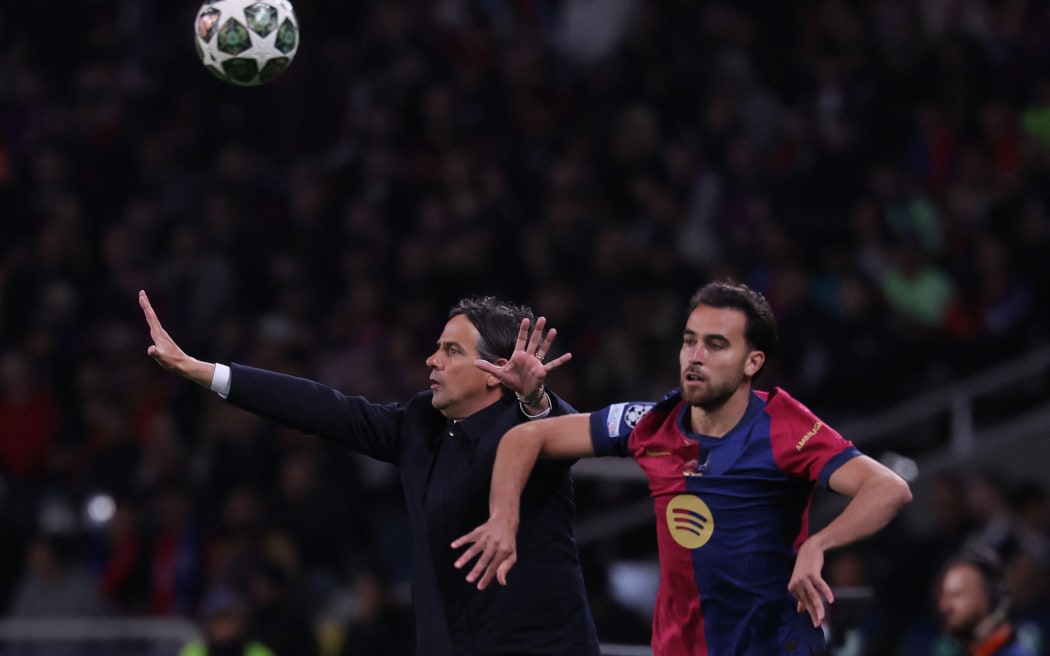 Inter Milan coach Simone Inzaghi gestures as Barcelona's Eric Garcia takes a throw-in during the UEFA Champions League semifinal first leg match at the Estadi Olimpic Lluis Companys in Barcelona, April 30, 2025.