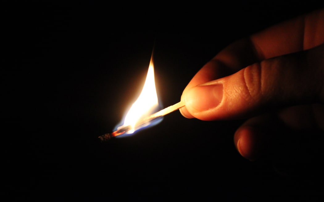 Burning match