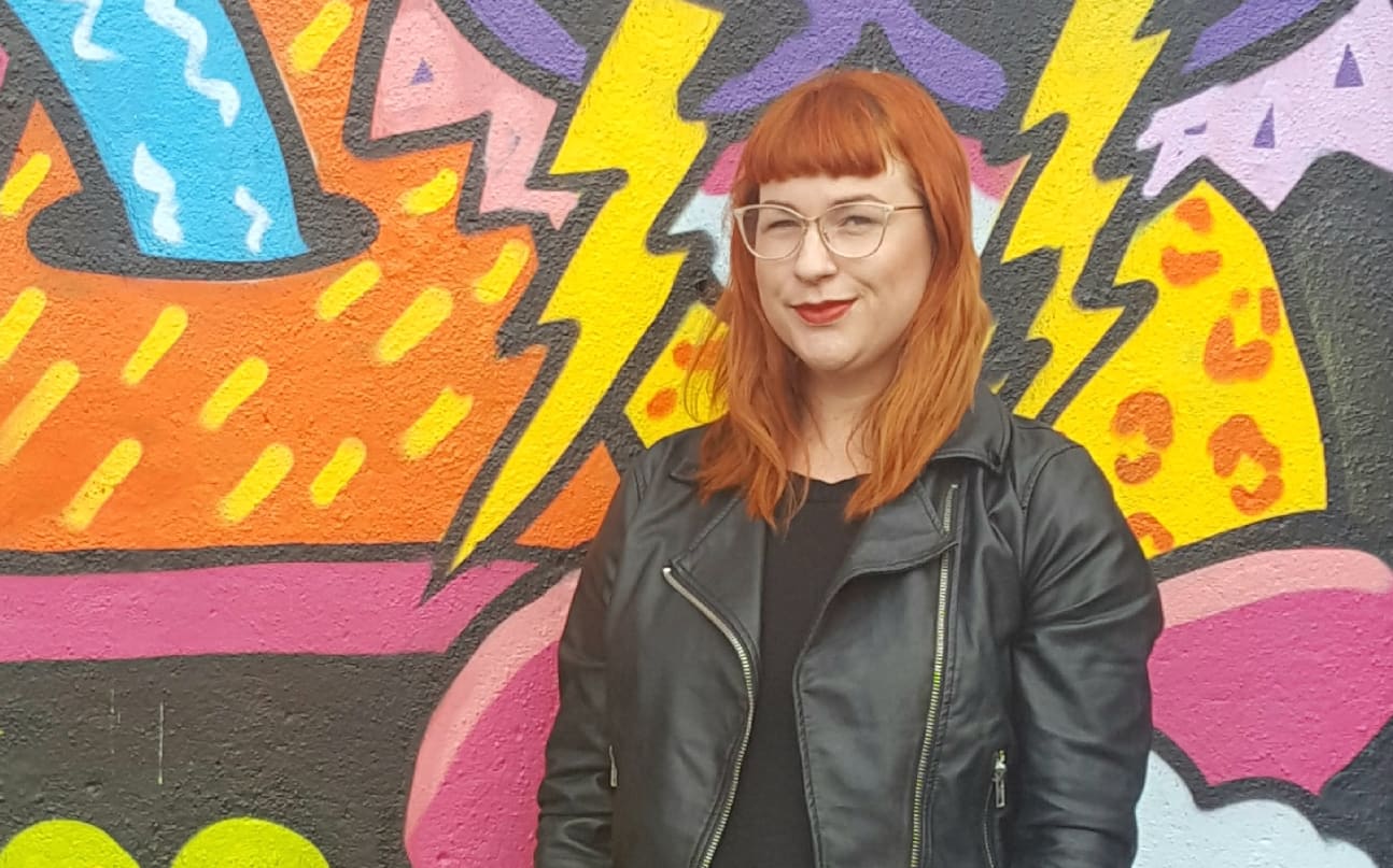 Artist Pinky Fang and guide dog Lyric.