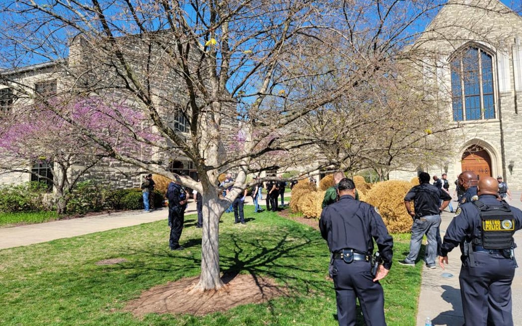 This image released by the Metro Nashville Police Department on their Twitter account on March 27, 2023, shows officers responding to a shooting at Covenant School, Covenant Presbyterian Church, in Nashville, Tennessee. - A heavily-armed young female killed three children and three staff at an elementary school in Nashville, Tennessee, on Monday, before being shot dead, police said. (Photo by Handout / Metro Nashville Police Department / AFP) / RESTRICTED TO EDITORIAL USE - MANDATORY CREDIT "AFP PHOTO /  BYLINE / SOURCE " - NO MARKETING - NO ADVERTISING CAMPAIGNS - DISTRIBUTED AS A SERVICE TO CLIENTS