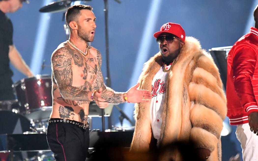 Adam Levine (L) and Big Boi perform during the Pepsi Super Bowl LIII Halftime Show at Mercedes-Benz Stadium.