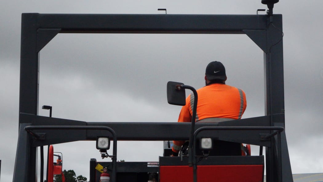 Emeio Clarke, 19, got his job with Downer through its high school work experience programme