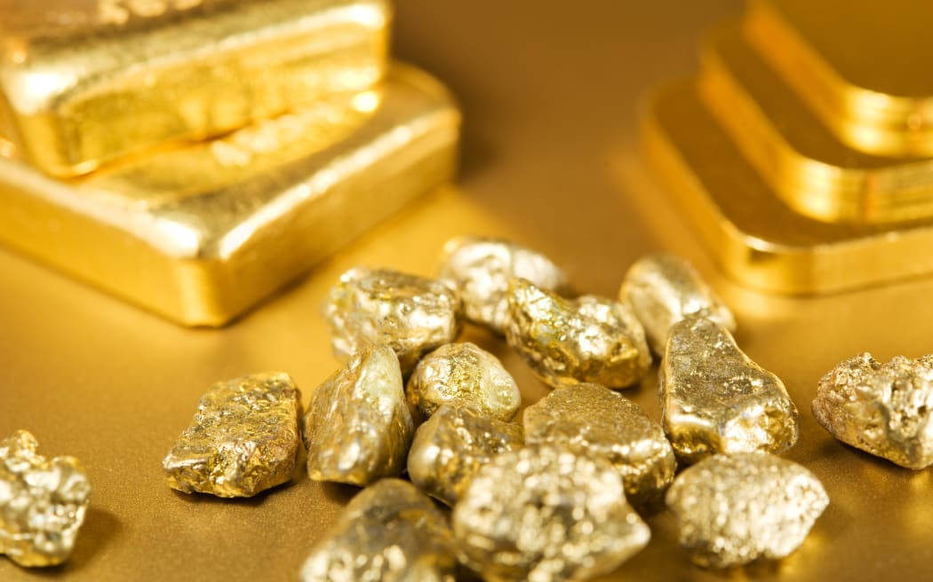 A collection of gold bars, ingots and nuggets (file)