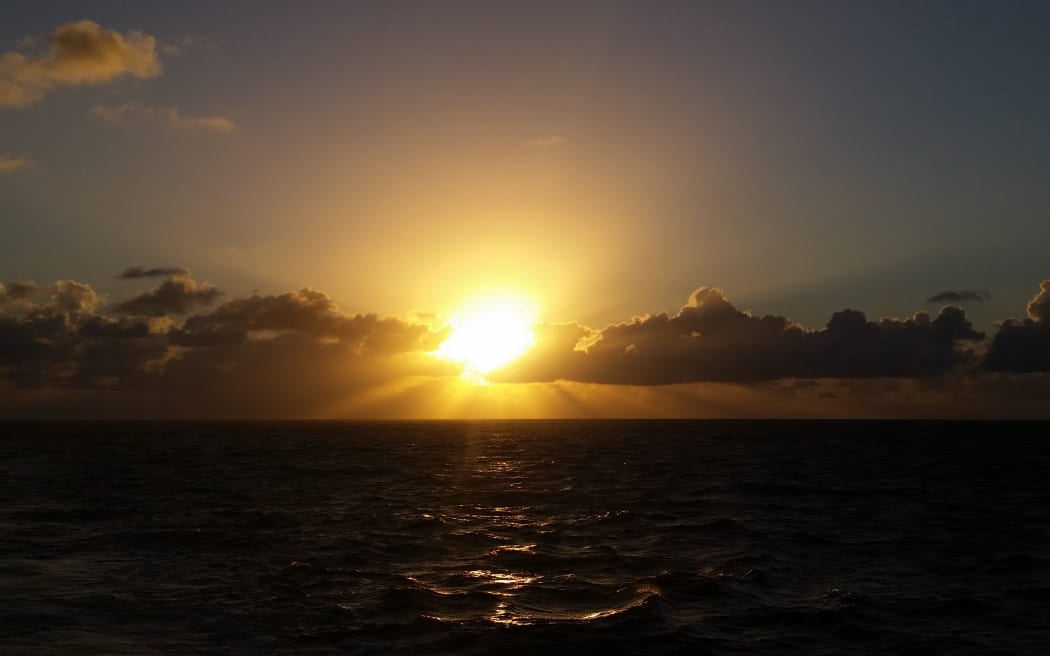 The sunrise over seas of the Lau group in Fiji