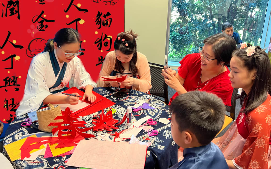 Chinese paper cutting artist sharing her creative works to audiences