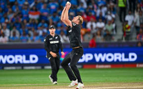 New Zealand's Kyle Jamieson takes a catch to dismiss India's Hardik Pandya during the ICC Champions Trophy one-day international (ODI) final cricket match between India and New Zealand at the Dubai International Stadium in Dubai on March 9, 2025.