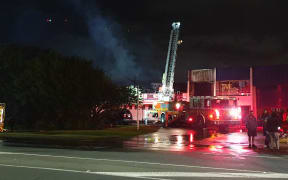 Firefighters outsideTruDesign Plastics at 243 Ti Rakau Drive.
