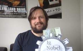 Dr Joerg Wicker with his Ig Nobel Prize