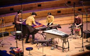 The percussion ensemble WATPIC performing on stage at the Auckland Town Hall
