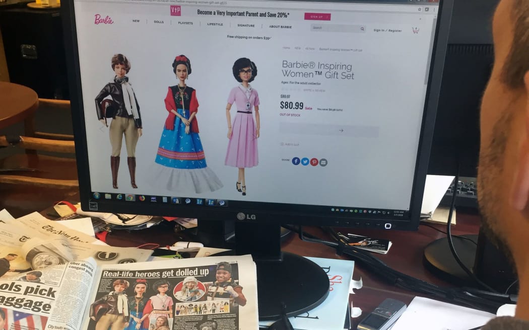 A website showing the new series Barbie "Inspiring Women", featuring (L-R) Amelia Earhart, Frida Kahlo and Katherine Johnson.