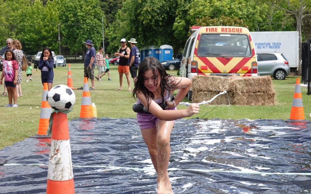 Nine-year-old Jaimee Stewart from Matauri Bay competes in Kāeo Fire Brigade’s bungee challenge.