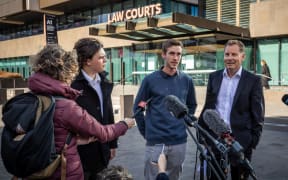 Gloriavale leavers outside Law Courts in Christchurch