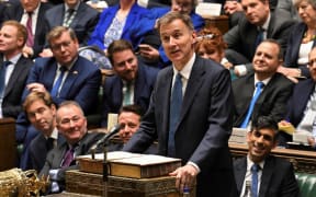 Britain's Chancellor of the Exchequer Jeremy Hunt presenting his Autumn Budget Statement at the House of Commons, in London, on November 22, 2023.