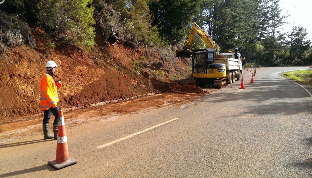 Work begins to clear a slip on Mangakahia Road in Northland.