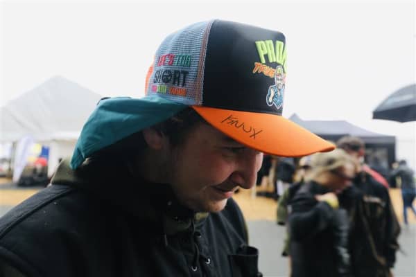 Michael Greathead from Pukekohe wearing a cap with a neck flap, signed by Knux, at Fieldays on 12 June, 2025.