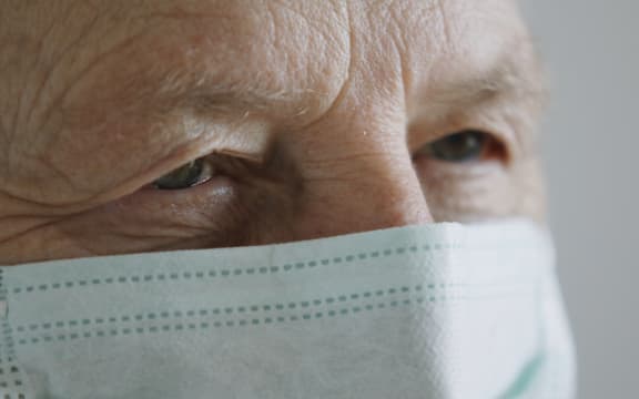 Senior man with medical mask. Prevention of the coronavirus Covid-19 spread.