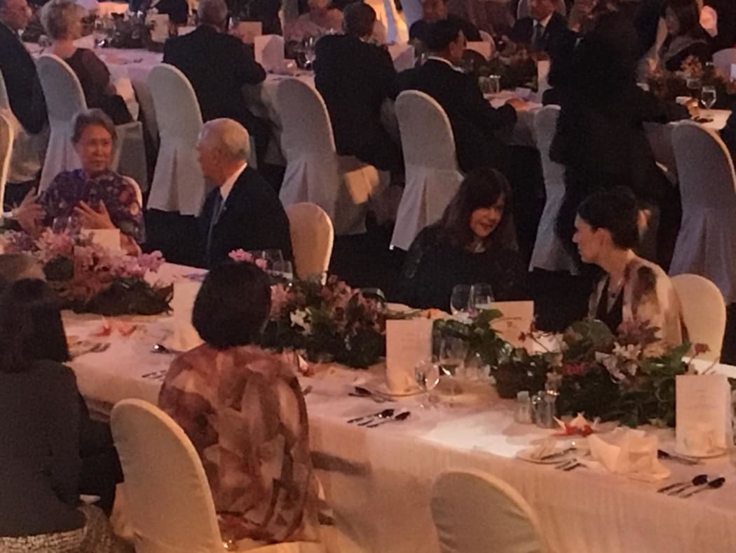 Prime Minister Jacinda Ardern at the East Asia Leaders dinner last night talking to Karen Pence, wife of  US vice-president Mike Pence, sitting to the left.