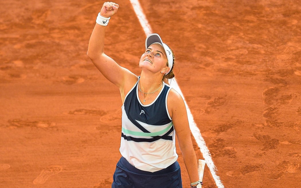 Barbora Krejcikova celebrates winning the 2021 French Open.