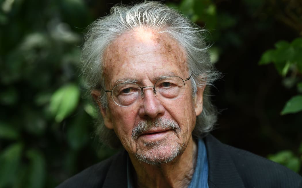 Austrian writer Peter Handke poses in Chaville, in the Paris surburbs, on October 10, 2019 after he was awarded with the 2019 Nobel Literature Prize. -