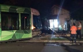 A Melbourne tram smashed into a home after colliding with a car.