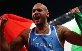 Lamont Marcell Jacobs of Italy reacts after winning Athletics men's 100m in Tokyo Olympic Games at Olympic Stadium in Tokyo on 1 August 2021.