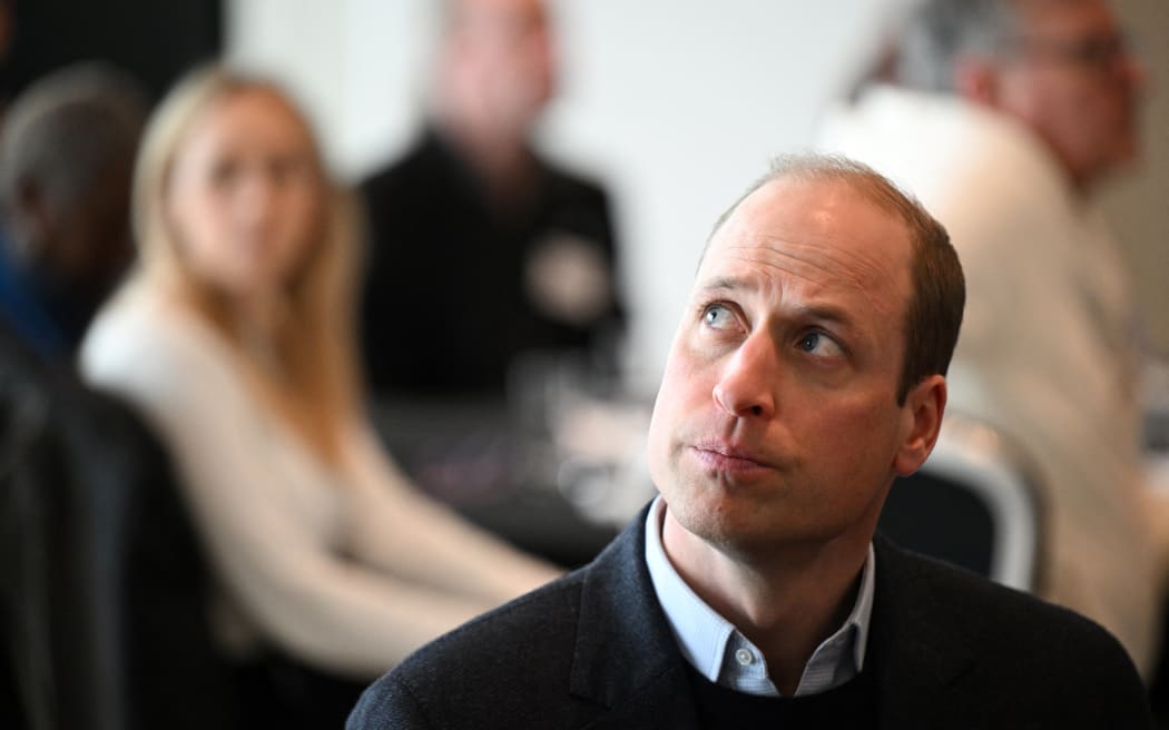 Britain's Prince William, Prince of Wales reacts as he attends a Homewards Sheffield Local Coalition meeting at the Millennium Gallery in Sheffield, northern England on March 19, 2024. Homewards is a transformative five-year programme which plans to demonstrate that by working collaboratively across all areas of society, it will possible to end homelessness in the UK. (Photo by Oli SCARFF / POOL / AFP)