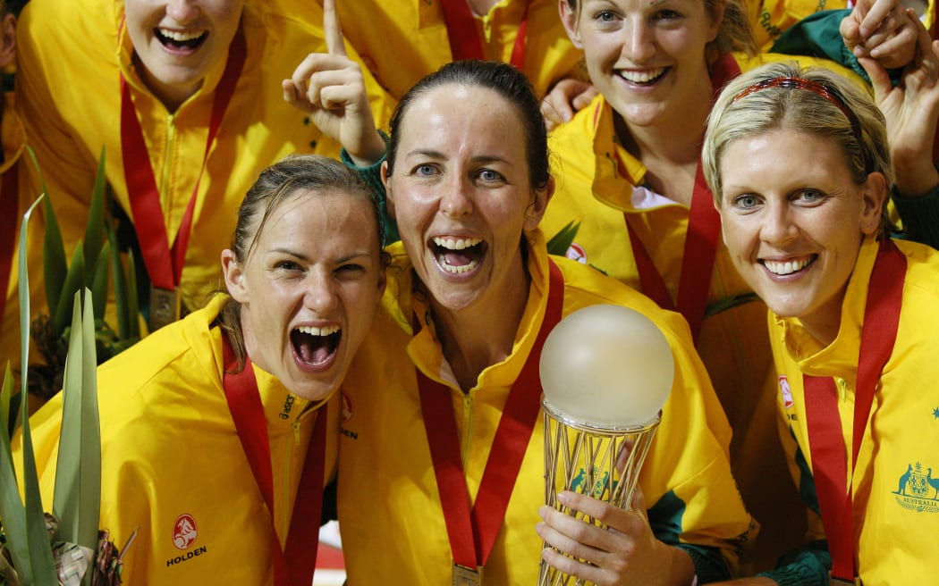 Sharelle McMahon, Liz Ellis, and Catherine Cox with the World Trophy after the Final of the Netball World Championships between New Zealand & Australia