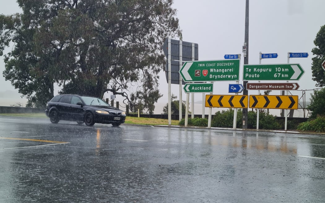 Waves lash the banks of the Wairoa River in the centre of Dargaville town, Kaipara, at 1.45pm on Monday 13 February. High tide is at 5.15pm and local authorities are assessing whether there is a danger the river could breach its banks and flood the town.