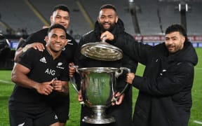 (L to R) Sevu Reece, Samisoni Taukeiâaho, George Bower and Richie Mo'unga with the Bledisloe Cup.