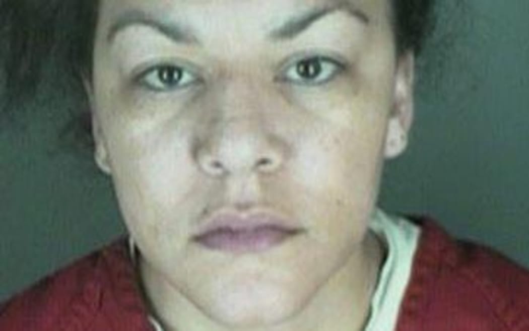 Dynel Lane, 34, who is accused of stabbing a pregnant woman in the stomach and removing her baby