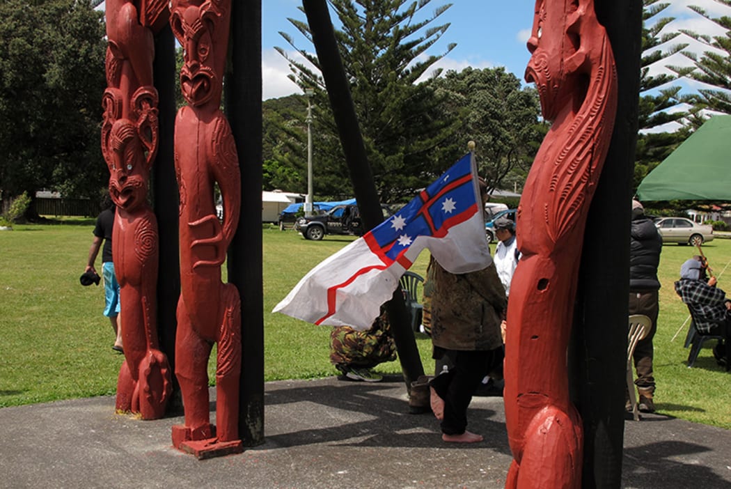 United Tribes' flag flying at Waitangi on October 28, the date that the Declaration of Independence/He Whakaputanga was signed in 1835, and the date chosen for the new annual commemoration of the New Zealand wars.