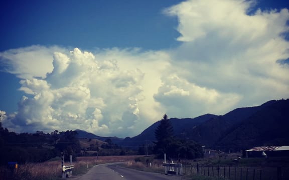 A front moves over Nelson, pushing tropical heat ahead of it.