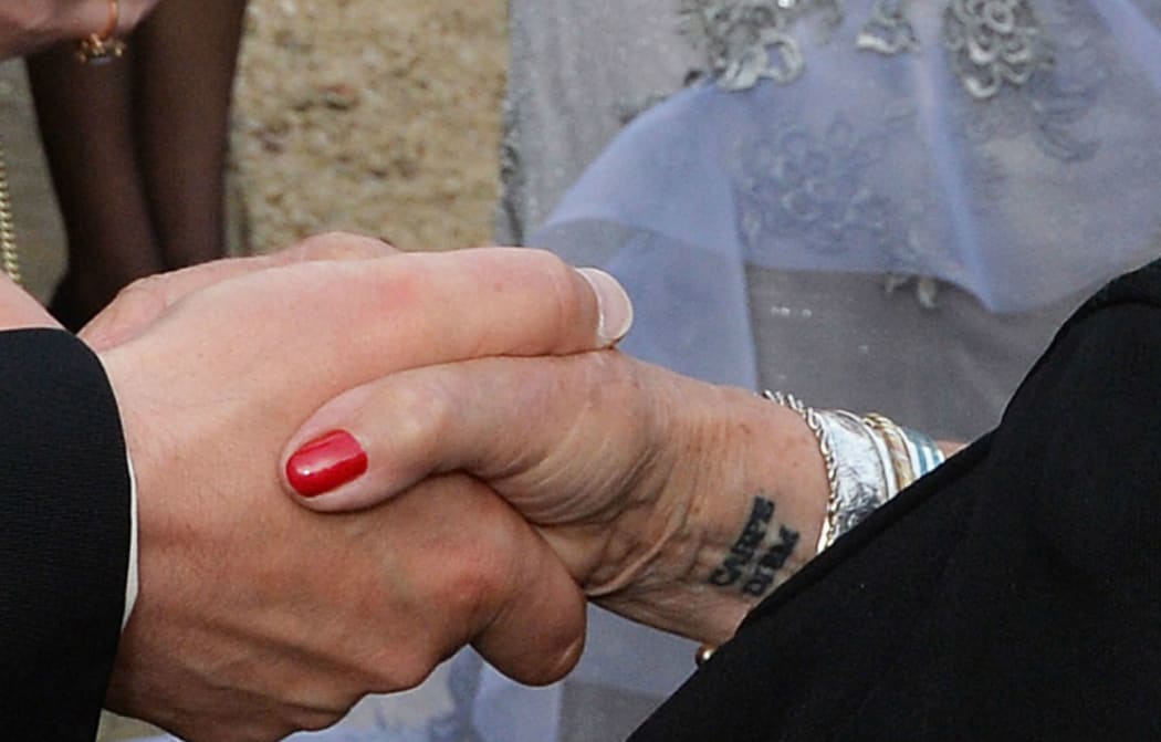 Proof of Judi Dench’s “Fish of the Day” tattoo