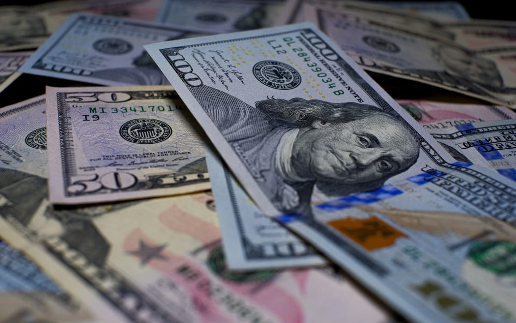 The economy in America highlights the power of the American dollar. Different denominations of American dollars are used. (Photo by Bibek Raj Giri/NurPhoto) (Photo by Bibek Raj Giri / NurPhoto via AFP)