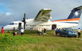 Air Marshall Islands, the country's national air carrier, is one of a 11 state owned enterprises that as a group have performed poorly and required government subsidy for decades. Air Marshall Islands' Dash-8 aircraft (pictured) off loading passengers and freight at Jaluit Atoll.