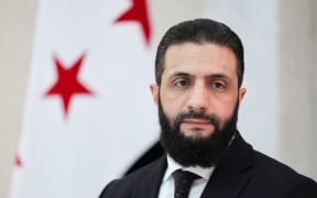Interim President Ahmed al-Sharaa sits for an interview at the presidential palace in Damascus, Syria, on March 10.