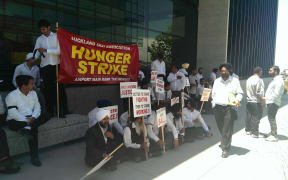 Taxi drivers protesting outside the airport's office on Monday.