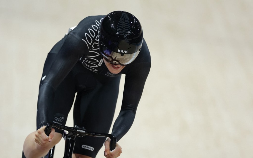 New Zealand's Ellesse Andrews competes in a women's track cycling sprint qualifying round of the Paris 2024 Olympic Games at the Saint-Quentin-en-Yvelines National Velodrome in Montigny-le-Bretonneux, south-west of Paris, on August 9, 2024. (Photo by Thomas SAMSON / AFP)