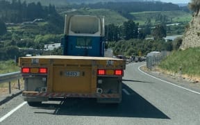 Traffic is building up after the lower Rakaia Bridge was closed after a crash between a motorcyclist and a truck.