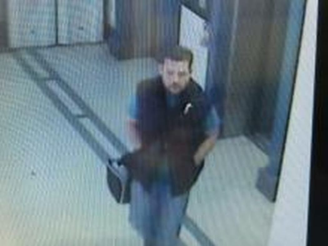 Police have released security footage of a man leaving a hotel near Albert Street.