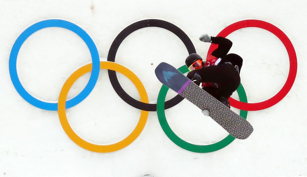 Carlos Garcia Knight from New Zealand performs a pirouette during the Snowboard Big Air finals in Pyeongchang.