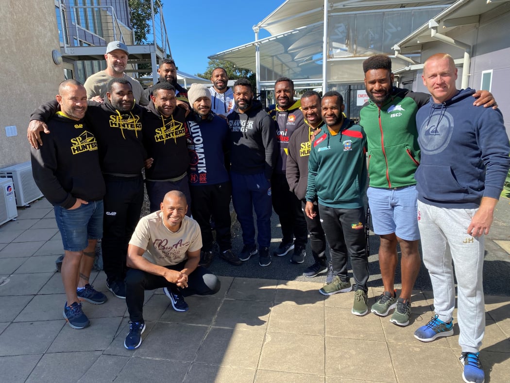 The PNG Hunters show their support for teammate Jokadi Bire.