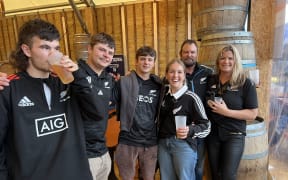 Sam Cane’s family at the Paris Rugby Village. Brendon Cane (second from right), Kate Rorison (third from right) and Matty Cane (centre).