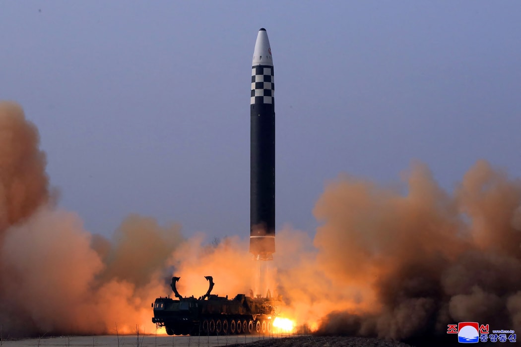 This picture taken on March 24, 2022 and released from Korean Central News Agency on March 25, 2022 shows the test launch of a new type inter-continental ballistic missile (ICBM) Hwasongpho-17 in an undisclosed location in North Korea.