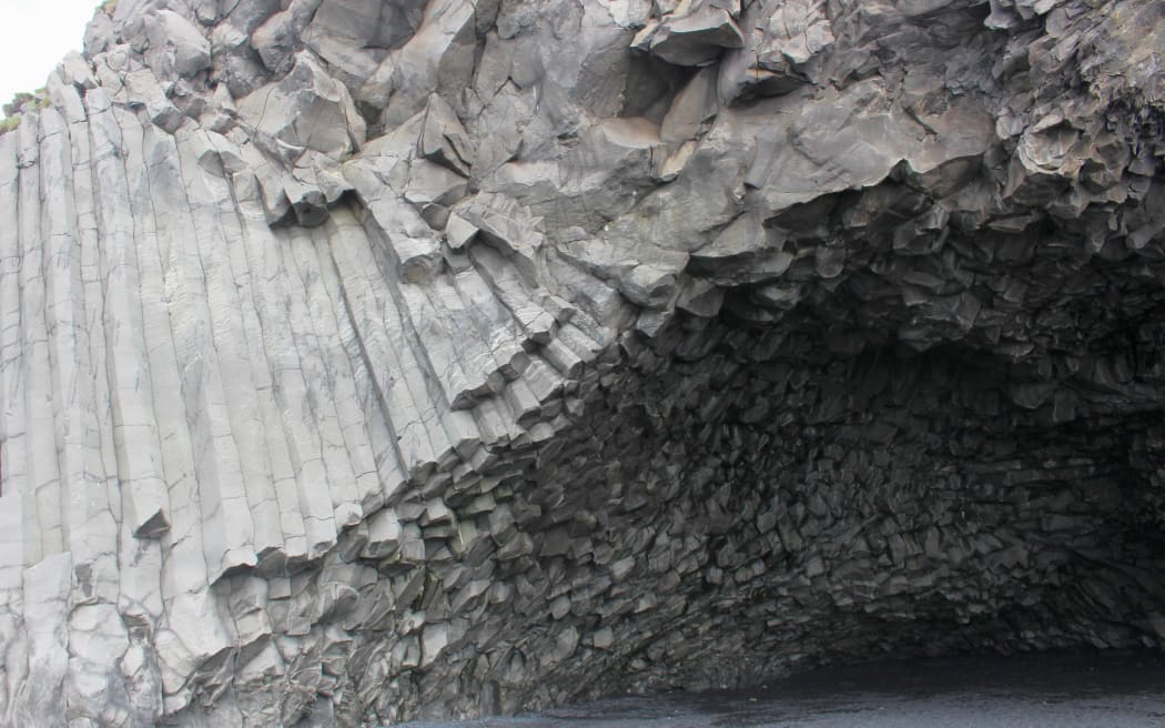 Cave in southern Iceland made up of geological block shapes.