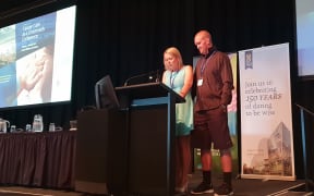 Melissa Vining fought back sobs as she told 400 cancer specialists in Wellington what her family has been through after her husband's terminal bowel cancer diagnosis.